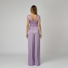 A harmonious blend between comfort and sophistication, our Lylia Silk Wide-Leg Pants redefine elegance with every step. Impeccably tailored from lavender double silk satin, they present a flattering high-waist with expertly placed darts and a wide-leg cut with a pressed crease detail which visually elongates the silhouette. The concealed zipper and hook fastening in the front ensures ease of wear and a seamless finish.  Match: Complete the look with the Lylia Silk Camisole.  Each Il Volo item is Sleek Silk High-waisted Wide Leg Pants, Chic Full-length Silk Wide Leg Pants, Sleek Silk Wide-leg Pants, Silk Wide-leg Pants With Pressed Crease, Tailored Full-length Silk Pants, Silk Wide Leg Pants, Silk Camisole, August Birthstone Jewelry, July Birthstone Jewelry