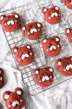 red velvet cookies with marshmallows are on a cooling rack, ready to be eaten