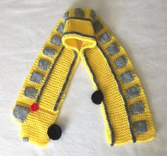 Great novelty scarf, all the kids will want one!  Make one for your favorite school bus driver too!  Easy to follow pattern, using worsted weight yarns (a size 4 yarn) and knitting needles US # 9, (plus US # 6 for the detailing).  It won't take long to make this scarf, so make one for all the kids in the family, plus the school bus driver!   What a great novelty gift idea this Holiday season! Finished scarf is about 37 inches long.  Everyone will ask where you got the pattern, and you may get re Wooden Knitting Needles, Hood Pattern, Circular Knitting Machine, Crochet Baby Shoes Pattern, One For All, School Bus Driver, Hooded Scarf, Knitted Hood, Scarf Knitting Patterns