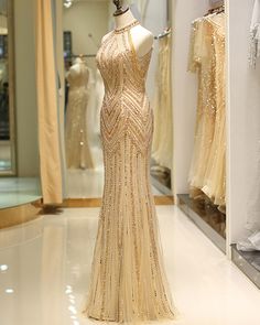 amazing beading high neck gold mermaid style evening dress Gold Full-length Fitted Dress, Gold Fitted Halter Evening Dress, Elegant Full-length Gold Evening Dress, Glamorous Gold Fitted Halter Dress, Black Prom Dresses Mermaid, Winter Formal Dresses Long, Gold Sequined Floor-length Mermaid Dress, Winter Formal Dresses, Black Prom