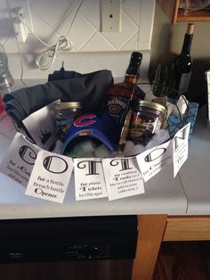 a basket filled with lots of food and drinks