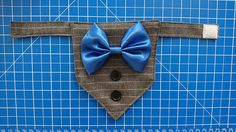 a bow tie on top of a piece of cloth