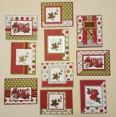 christmas cards are arranged on the wall with red and green trimmings, including poinsettis