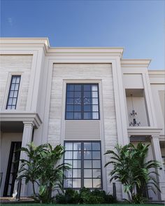 a large white building with lots of windows