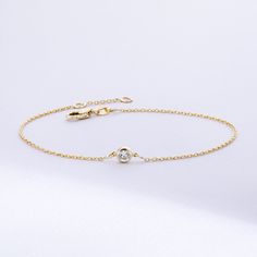 Solitaire Diamond Bracelet in 14K or 18K solid Gold, Bezel Set Dainty Diamond by the Yard Bracelet, Minimalist Bracelet Gift for Women, Graduation Gifts, Gift For Valentine, Gift For Birthday, Gift For Bridesmaid, Wedding Gift For Her ► Adding a customized tiny bar at clasp may be a good idea: https://etsy.me/3cn9OQ5 Material: Solid Gold, real gold (not gold plated or gold filled material) Karat: 14K (585), 18K (750) Gemstone: Genuine Diamond Available diamond options (size mm - weight ct): 1.80 Elegant Gold Chain Bracelet With Bezel Setting, Elegant 14k Gold Chain Bracelet With Bezel Setting, Gold Diamond Bracelet With Birthstone, Elegant Gold Diamond Bracelet With Birthstone, Elegant Gold Diamond Birthstone Bracelet, 14k Gold Chain Bracelet With Bezel Setting, 14k Gold Chain Bracelet With Bezel Setting As Gift, 14k Yellow Gold Chain Bracelet With Bezel Setting, 14k White Gold Bracelet With Single Diamond