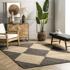 a living room with a large plant in a pot on top of a rug next to a chair