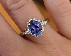 Alexandrite ring leaf ring oval shaped engagement ring June | Etsy Elegant Oval Tanzanite Rings, Elegant Sterling Silver Birthstone Ring With Halo, Elegant Sterling Silver Halo Birthstone Ring, Purple Sapphire Oval Ring, Oval Purple Sapphire Rings, Elegant Oval Tanzanite Birthstone Ring, Tanzanite Oval Birthstone Promise Ring, Elegant Oval Birthstone Ring In 14k White Gold, Oval Tanzanite Birthstone Promise Ring