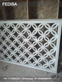 an image of a decorative screen that is made out of wood and white plastic material