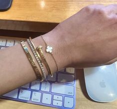 Cartier Love Bracelet Stack Apple Watch, Cartier Ring Stacking, Luxury Designer Bracelet Stack, Stacked Cartier Love Rings, Sweet Alhambra Bracelet Stack, Gold Bangles Stacked, Cartier Love Bracelet Stack Ideas, Vancleef Cartier Stack, Tennis Bracelet Stack Cartier