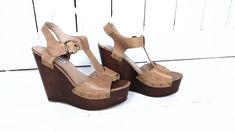 "Steve Madden open toe platform wedge sandal/t strap sandals/high heel wedge leather sandals/9 Measurements... - marked size: 9 - insole length: 10\" -width at ball: 3\" -heel: 5\" -front platform: 1.75\" Features... -genuine leather -high platform -adjustable strap -Steve Madden Condition... -great leather condition -minor scuffing on leather -minor wear on the soles and platform 1I3220*" High Heel Wedges, Boho Purses, Leather Wedge Sandals, T Strap Sandals, Heels & Wedges, Platform Wedge Sandals, Platform Wedge, Wedge Sandal, T Strap