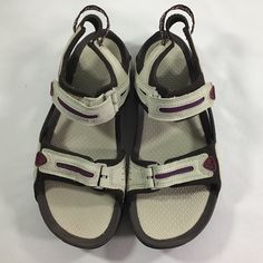 Nike Acg Sandals Size 7 Colors Beige/Brown/Purple Velcro Front Straps Slight Speck Not Noticeable On Left Shoe *** Please See Photos New Never Worn *** No Box Available Smoke/Pet Free Home Offers Welcome! Shoe Rack Casual Purple Sandals With Ankle Strap, Purple Round Toe Sport Sandals For Summer, Casual Purple Sport Sandals For Summer, Purple Ankle Strap Sandals For The Beach, Purple Open Toe Sandals For Outdoor, Casual Purple Open Toe Sport Sandals, Casual Purple Sandals For Outdoor, Nike Acg Air Zoom Gaiadome, Adjustable Synthetic T-strap Sandals With Textured Footbed