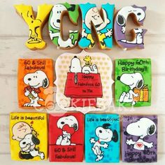 the cookies are decorated with snoopy characters and words that spell out happy birthday to you