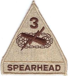 an embroidered patch with the words spearhead on it