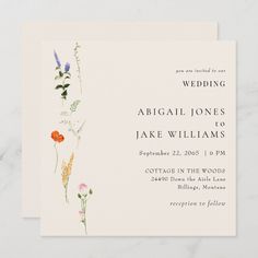 a wedding card with wildflowers on the front, and an orange flower on the back