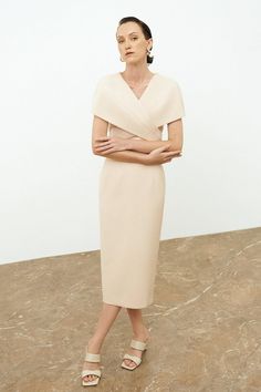 Formal Midi Dress With Draped Sleeves And Surplice Neckline, Elegant Structured Beige Dresses, Elegant Midi Dress With Draped Sleeves And Surplice Neckline, Cocktail Wrap Dress With Draped Sleeves, Structured Beige Formal Dress, Chic Wrap Dress For Office, Beige Structured Formal Dress, Elegant Beige Short Sleeve Bodycon Dress, Elegant Surplice Neckline Dress For Office