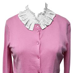 Look elegant and classy with our floral lace half shirt faux collar. The collar features a lace ruffle with lovely looking floral lace. The collar is also detachable; you can wear it under your sweaters, blouses, casual shirts, and dresses for a more vintage and formal look. The perfect fashion accessory; goes easily with all collar-less attire as if it is really a part of the clothing. Detachable collar that can seamlessly go under sweaters, blouses, shirts and dresses. The perfect fashion accessory that looks like it is really a part of the clothing. Dimensions: Neck Circumference: 15.75 inches; Shoulder 12.5 Inches Across; Front Length: 10 inches; Back Length: 7.5 inches. Material: Lace. Feminine Lace Collar Top For Fall, Feminine Tops With Lace Collar For Fall, Feminine Fall Tops With Lace Collar, Fitted Blouse With Cute Collar For Fall, Fitted Long Sleeve Top With Detachable Collar, Fitted Tops With Lace Collar For Layering, Fitted Top With Lace Collar For Layering, Detachable Spring Collar, Elegant Collared Tops With Lace Trim