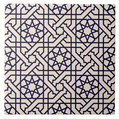 a blue and white rug with an intricate design on the front, in various sizes