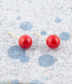 Get ready to add a pop of color to your look with these exquisite Dot of Red Coral Stud Earrings! Handcrafted and finished with care, these earrings feature genuine red coral spheres measuring .3" in diameter and are mounted on gold-plated brass posts. Perfect for any occasion, these earrings weigh in at just 2 grams. Embrace the beauty and uniqueness of these one-of-a-kind earrings today! Description: Coral is not a stone but an organic material formed by living organisms, specifically coral polyps. It's most commonly found in shades of red, pink, white, and black. Coral grows in branches that mimic underwater tree-like structures and is harvested from the ocean depths, primarily in the Mediterranean Sea and the Pacific Ocean. It's popular in jewelry for its vibrant colors and is often ca Coral Polyps, Living Organisms, Ocean Depth, Black Coral, Ocean Conservation, Mediterranean Sea, Red Coral, Pacific Ocean, Shades Of Red