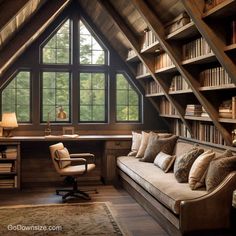 a room with a couch, chair and bookshelf