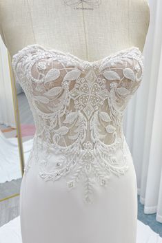 the back of a wedding dress on display