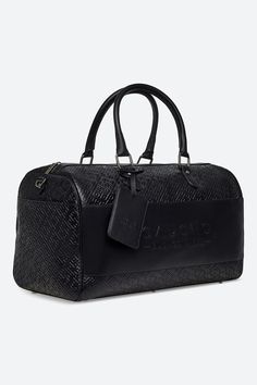 Going somewhere? Don't forget to pack your Weekender bag. This classic duffel holdall is crafted from calfskin embossed with our signature tessellated logo pattern for a tough, durable finish that will age beautifully. Tube handles and an adjustable shoulder strap (with detachable shoulder pad) make light work of heavy lifting, and there's a laptop compartment and plenty of pockets to keep everything organised. Spacious yet sleek – it'll make work trips and getaways that little bit smarter in al Weekend Travel Bags, Light Work, Heavy Lifting, Aging Beautifully, Logo Pattern, How To Make Light, Work Travel, Weekender Bag, Luggage Tags