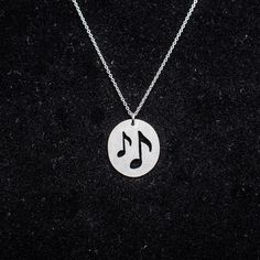 Silver music notes pendant. Musical pendant - best music lover gift. Tiny fashionable pendant for a musician. Music notes pendant is hand cut from silver plate. Dimensions of the pendant: about 18x16 mm. Matt brushed finish. You can choose between the pendant only or pendant on the tiny silver (925) chain. The length of the chain in this second option: about 42 cm (~ 16,5 ") Silver music notes pendant (or necklace) is packed in gift box. Of course, everything is protected by the bubble envelope Music-themed Metal Jewelry For Gifts, Silver Music-themed Metal Necklace, Silver Music-themed Metal Jewelry, Music-themed Silver Metal Jewelry, Silver Music-themed Round Jewelry, Sterling Silver Jewelry For Concerts, Music-themed Sterling Silver Necklace, Music-themed Silver Pendant Necklace, Nickel-free Silver Music-themed Necklaces