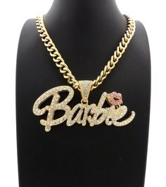 Women Gold Plated Bling Barbie Iced Cubic Zirconia Charm & Cuban Chain Necklace HIP HOP CELEBRITY STYLE BRAND NEW USA SELLER Product Description Hip Hop Iced Cuban Chain : Hip Hop Celebrity Style Chain 10mm 18" 20" 24" 30" Cuban Chain 14K Gold, Silver plated over alloy Pendant :  Hip Hop Celebrity Style Pendant Pendant Size : 90mm x 45mm Cubic Zirconia Stones 14K Gold, Silver plated over alloy High Quality and polished. Payments: US Customers: Paypal accepted International Customers: Paypal acce Barbie Necklace Jewelry, Nicki Minaj Barbie, Fingerprint Necklace, Handwriting Necklace, Cuban Chain Necklace, Karma Necklace, Star Necklace Silver, Star Charm Necklace, Pink Friday