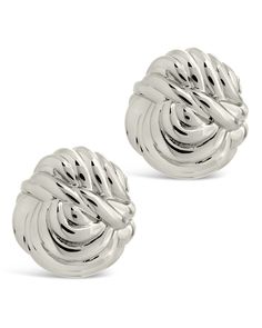 Add a sophisticated touch to your wardrobe with our Brioche Twist Stud Earrings. Crafted with a polished finish and inspired by the delicate layers of a patisserie, these stud earrings will elevate any outfit. Experience the luxury of tasteful elegance with our exclusive design. Material: 14K gold or rhodium plated brass Features: 0.7" stud, Lead & Nickel free, post back Classic Silver Tarnish-resistant Clip-on Earrings, Chic White Gold Earrings For Evening, Chic Silver Earrings With Polished Finish, Chic Formal Earrings With Polished Finish, Chic Silver Clip-on Jewelry, Chic Polished Formal Earrings, Elegant Nickel-free Clip-on Earrings For Evening, Classic White Gold Plated Earrings, Elegant Nickel-free Clip-on Earrings For Formal Occasions