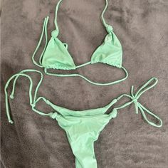 Size M, But Def More For A Small Or Even An Xs Super Cheeky! Never Worn Bought For $75 Turquoise Tie-side Bottom Swimwear For Beach, Green Stretch Swimwear For Vacation, Green Stretchable Swimwear For Vacation, Turquoise Halter Neck Swimwear For Swimming, Turquoise Swimwear For Spring Poolside, Stretch Turquoise Swimwear For Pool, Turquoise Halter Neck Swimwear For Poolside, Green Triangle Top Swimwear For Pool, Turquoise Tie-side Bottom Swimwear For Pool