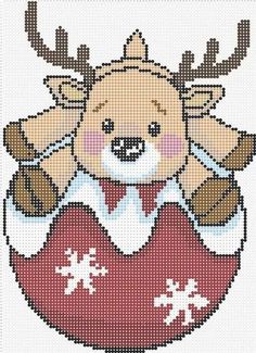 a cross stitch christmas ornament with a teddy bear in it's chest