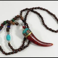 Beautiful Wooden Beads With Colorful Separators. Wooden Horn Is Decorated With With Silver, Gold, And Colorful Trim. Lightweight, 20” Non-Adjustable. Very Unusual Looking. Good For Male Or Female. Brown Beaded Necklace With 108 Beads For Festivals, Bohemian Brown Beaded Necklaces With 8mm Beads, Bohemian Brown Beaded Necklace With 8mm Beads, Brown Beaded Necklace For Festivals, Unique Adjustable 8mm Bead Necklaces, Unique Adjustable 8mm Beads Necklace, Unique Adjustable 8mm Beaded Necklace, Brown 108 Beads Festival Necklace, Adjustable Long Beaded Necklace With 8mm Beads