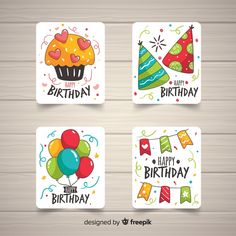 four happy birthday cards with balloons and cupcakes on wooden background free psd file