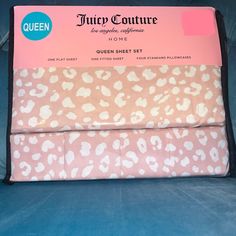 three pieces of pink and white leopard print fabric on top of each other with black trim