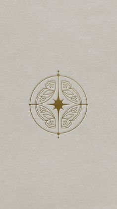 a white wall with a circular design on it's side and a star in the middle