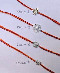 This listing is for one individual rakhi bracelet - add more than one to your cart for multiple bracelets or shop one of the pre-made bundles here: https://www.etsy.com/shop/TriyaDesigns?section_id=29470484 The ends of the rakhi bracelet are string. This string can be used to tie the rakhi. Each Rakhi is one size fits most - 11.5 inches. If you would like a different length, please request a custom order. Select Charm (See Pictures) Charm 1 Charm 2 Charm 3 Charm 4 Select Add-Ons None Mini Rakhi Orange Bracelet For Festivals As Gift, Orange Bracelets For Festivals Gift, Orange Bracelets As Festival Gifts, Orange Festival Bracelet As Gift, Adjustable Jewelry As Festival Gift, Adjustable Jewelry For Festive Gift Occasions, Adjustable Jewelry For Festival Gifts, Adjustable Jewelry For Gifts And Festivals, Adjustable Orange Jewelry For Festivals