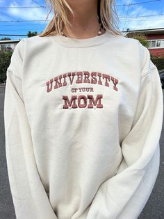 University of your MOM Sweatshirt! These sweatshirts and more are hand-made Each article made is locally crafted with heavy input from you! The sweatshirts and color of stitching can be picked according to your desires, and our advanced machine makes it possible to do almost any possible color combination. Kindly feel free to contact us at any time about any questions you might have!! University Of Your Mom Sweatshirt, Oversized White Sweatshirt For Campus, Cotton Sweater With Letter Embroidery For Streetwear, Oversized Cotton Sweater For Campus, Varsity Letter Embroidery Sweatshirt For Campus, Varsity Style Letter Embroidery Sweatshirt For Campus, Varsity Sweatshirt With Letter Embroidery For Campus, Varsity Style Sweatshirt With Letter Embroidery For Campus, Varsity Crew Sweatshirt With Embroidered Text