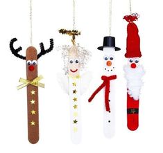 three christmas decorations hanging from strings on a cell phone screen, with the caption in german