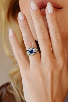 a close up of a person wearing a ring