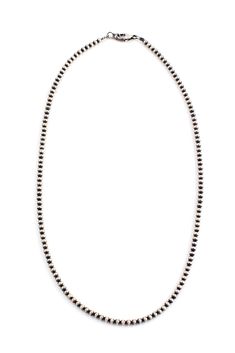 A single strand of Oxidized Sterling Silver Beads can add presence and dimension to a beautiful pendant. The necklace is made up of 4mm sterling silver beads and has a comfortable and secure lobster clasp. In Santa Fe, New Mexico, sterling silver beads are a wardrobe staple. They are affectionately called, "Pearls of the West". Imagine how often you will wear them. Add a pendant or wear this necklace alone. Its an American classic you will enjoy for years to come. Oxidized for that vintage look. Mexican Jewelry, Santa Fe New Mexico, Silver Eagles, Southwestern Jewelry, American Classic, Oxidized Sterling Silver, Sterling Silver Bead, Silver Beads, Santa Fe