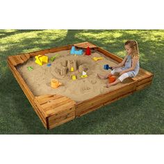 The KidKraft Backyard Sandbox gives kids a perfect place to build sandcastles, dig for treasure and play with all of their favorite sand toys. With built-in seating, there is plenty of room for multiple kids to play together. Sandbox With Canopy, Backyard Sandbox, Wooden Sandbox, Diy Sandbox, Kids Sandbox, Patio Grande, Kids Outdoor Furniture, Sand Toys, Large Backyard