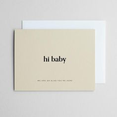 a card with the words hi baby printed on it and an envelope in black ink