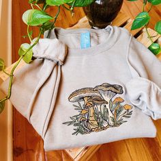 Follow @lebeaudenimco on Instagram to be the first to know about size restocks! Say hello to your new favorite sweatshirt! This cozy crew is designed, digitized, & stitched in our northern Virginia based studio.  * Each crew neck is made to order based on size of your choice. They are already dyed. Please allow up to 14 days to be completed and shipped out. * Please reach out prior to purchase for custom requests. These requests can include size, style, or sweatshirt color. Please note that these requests may cause an increase in price or completion time. I am happy to accommodate need by dates as long as I hear from you prior to purchasing the item. Material: - 50% Cotton, 50% Polyester - All hoodies and crewneck sweatshirts are fleece. Care instructions: - Machine cold wash, inside out, Winter Long Sleeve Tops With Embroidered Patch, Embroidered Long Sleeve Winter Tops, Long Sleeve Tops With Embroidered Patch For Winter, Winter Cotton Tops With Embroidered Patch, Winter Cotton Top With Embroidered Patch, Long Sleeve Tops With Embroidered Patch For Fall, Fall Cotton Sweatshirt With Floral Embroidery, Fall Cotton Sweatshirt With Embroidered Patch, Casual Machine Embroidered Sweatshirt For Fall