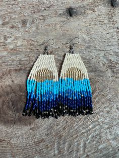 Handmade beaded earrings featuring the Smoky Mountains. The sun is setting in gold beads. Inspired by the Appalachian Mountains and/or the Blue Ridge Mountains. Beaded Mountain Earrings, Beaded Earrings Native Fire Mountain Gems And Beads, Blue Ridge Mountains Illustration, Southwestern Blue Beaded Fringe Earrings, Mountain Earrings, Blue Ridge Mountain, Hand-strung Blue Southwestern Jewelry, Handmade Beaded Earrings, Handmade Earrings Beaded