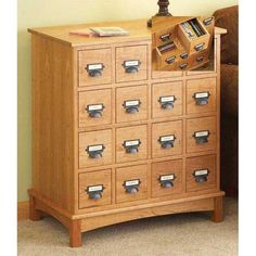 a wooden cabinet filled with lots of drawers