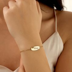 Elevate your accessory game with our exquisite Personalized Name Bracelet With Heart. Meticulously crafted from high-quality materials, this bracelet combines elegance with sentimentality. The highlight is the customizable feature, allowing you to inscribe a name of significance, creating a truly unique piece that speaks volumes about your affection. The delicate heart charm adds a touch of romance and completes the look with finesse. Whether it's a gift for a loved one or a treat for yourself, Bracelet With Heart, Gold Engraving, Name Bracelet, Colorful Bracelets, Charm Bracelets, Mother's Day Gift, Gift For Mom, Heart Charm, Mother's Day Gifts