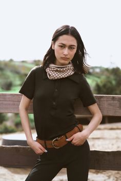 Model Tegan Wears size XXS (5’5” tall, 24” inch waist, 32a” chest, Hips - 35”) The Gato Polo shirt is a slim fit merino wool top with a pointed collar and partial button placket. This product is made with Merino Wool. The merino is all traceable, non mulesed and RWS certified. All of the polyester used in this yarn is recycled. A luxury wool with inherent performance enhancing qualities: Thermal-regulating, moisture wicking, antimicrobial, water repellant and soft yet durable. - Polo collar- Sho Slim Fit Polo Shirts, Wool Top, Slim Fit Polo, Simply The Best, Slim Fit Top, Equestrian Outfits, Best Black, Polo Shirt Women, Polo Collar