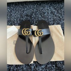 Gucci Leather Sandal With "Gg" Stud. Flat Heel. Thong Strap. Slide Style. Leather Lining. Smooth Outsole. Made In Italy. Gucci Slides, Gucci Sandals, Fashion Shoes Heels, Shoes Gucci, Gucci Marmont, Bling Shoes, Gucci Leather, Handbag Shoes, Gucci Shoes