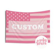 a pink and white american flag with the word custom on it's back side