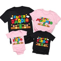 Shop Super Family Game Matching Tees with affordable from Beepumpkin™. Up to 30% off baby & kids personalized clothing make your life easy.Free Shipping $69+. Playful Custom Print Tops For Playtime, Fun Custom Print Tops For Playtime, Playful Father's Day T-shirt For Family, Cute Letter Print Tops For Family Events, Customizable Playful Pink T-shirt, Fun Character Print Tops For Family Events, Family Cartoon Print Cotton Tops, Family Cotton Tops With Cartoon Print, Playful Graphic Print Tops For Father's Day