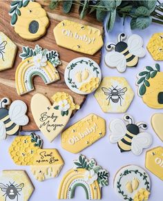 some decorated cookies are sitting on a table